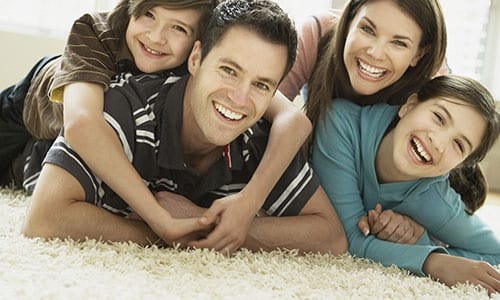 family-on-carpet